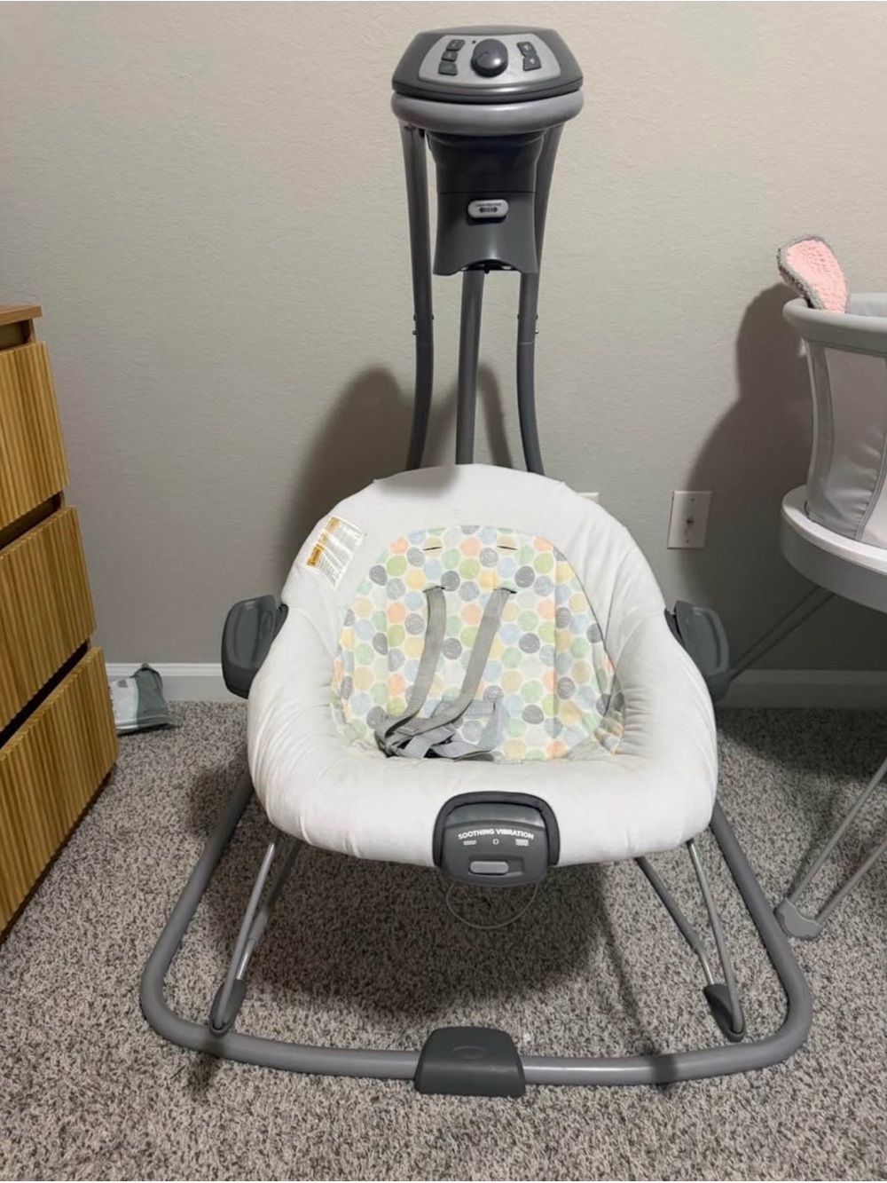 Neutral Gray and White Baby Swing with Multicolor Dot Seat